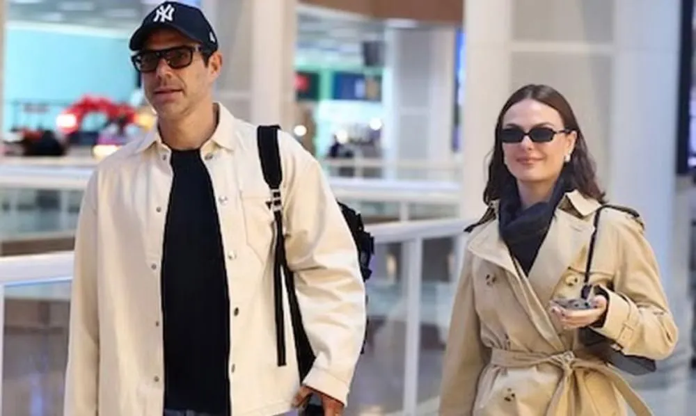 Ísis Valverde e Marcus Buaiz apostam em looks luxuosos para embarque em aeroporto do Rio; veja